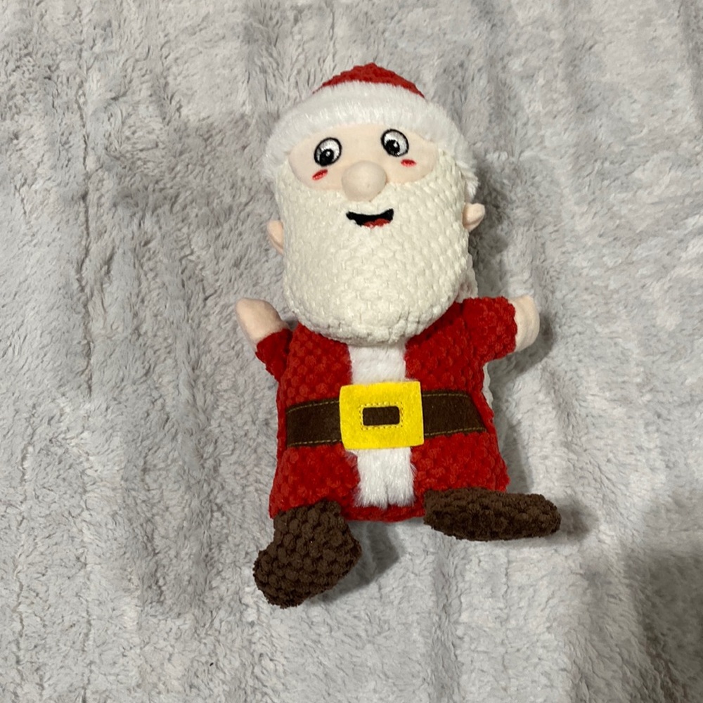 97. Dog puzzle squeaky Santa toy